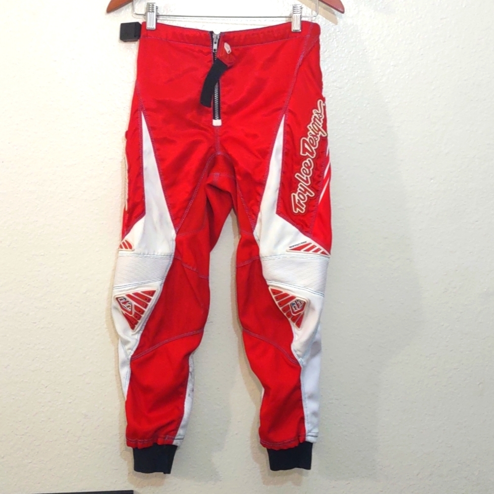 USED HAS STAINS TROY LEE DESIGN MOTORCROSS 28 YOUTH PANTS RED AND WHITE